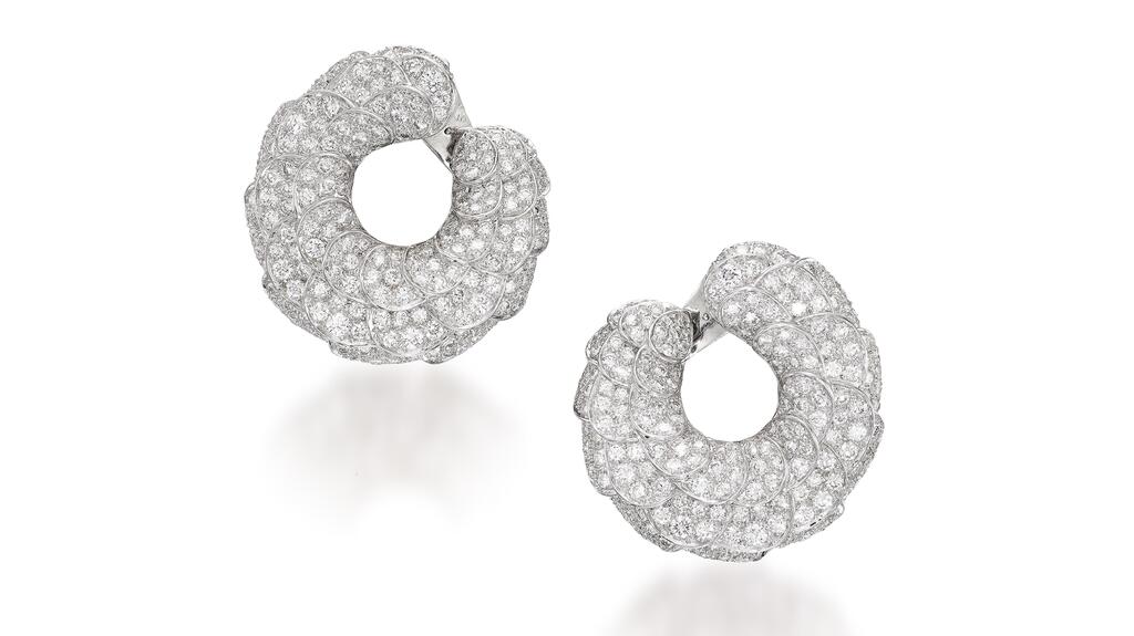 A pair of Cartier “Habana” earrings designed to depict a parrot’s layered feathers, set with approximately 11.20-carats of diamonds Cartier Habana earrings Bonhams